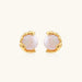 Gold vermeil studs with lustrous pink freshwater pearls in organic crescent settings