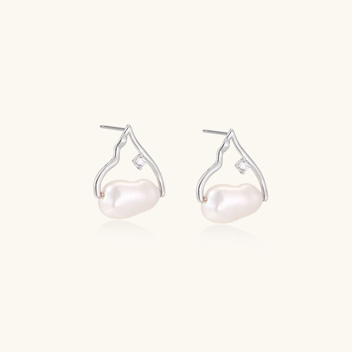 Silver mountain outline studs with baroque pearl and diamond accent on white background