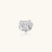 Silver-toned orchid ring with textured petals, pearl center accents, and sparkling zirconia stones on white background.