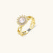 Two adjustable gold rings: chain-link band and halo-style ring with cubic zirconia stones on cream background